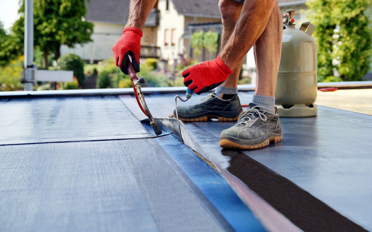 Professional flat roof repair services in Molino, FL