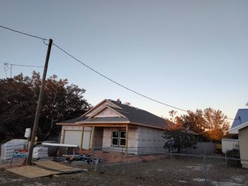 Completed metal roof replacement project in Gulf Breeze, FL by Wright Roofing